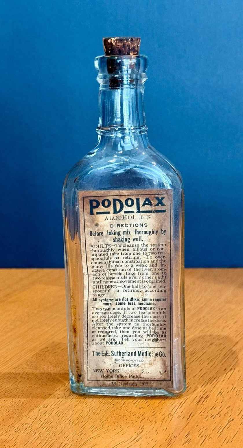 Antique Podolax Medicine Bottle E.E. Sutherland Medicine Co. with Label