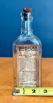 Antique Podolax Medicine Bottle E.E. Sutherland Medicine Co. with Label