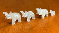 Set of 4 Vintage Hand Carved White Onyx Stone Elephant Figurines Raised Trunk