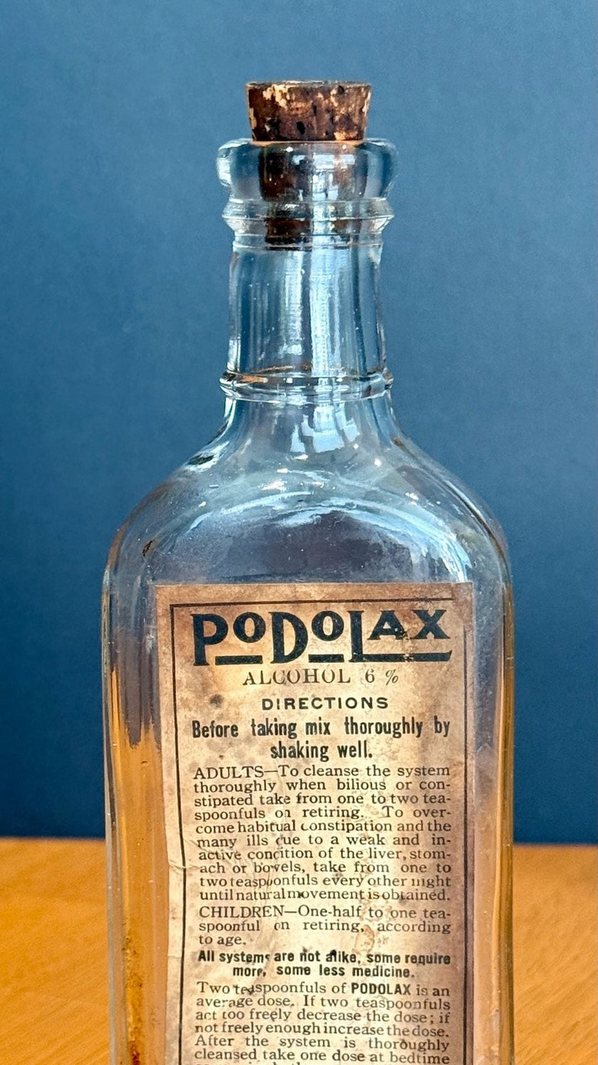Antique Podolax Medicine Bottle E.E. Sutherland Medicine Co. with Label