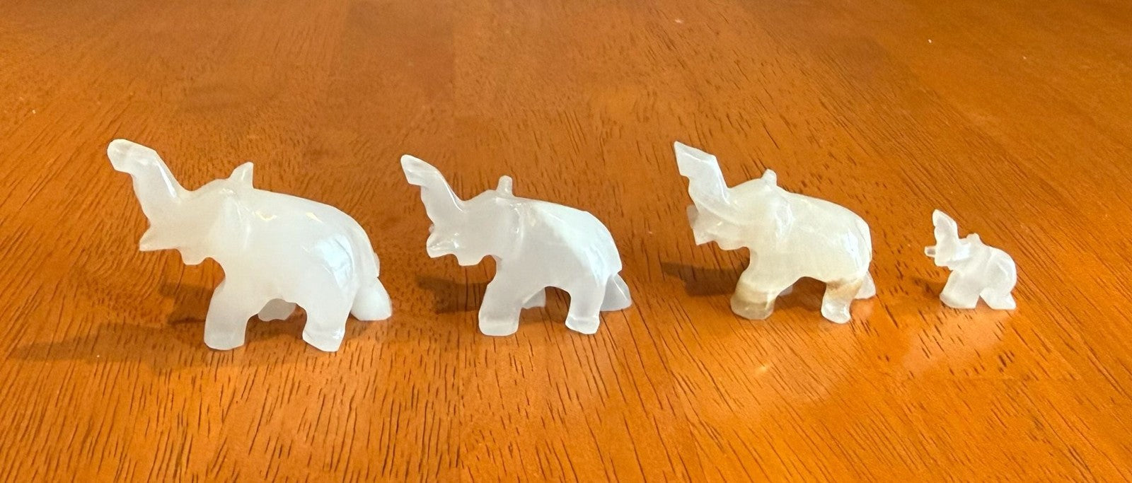 Set of 4 Vintage Hand Carved White Onyx Stone Elephant Figurines Raised Trunk