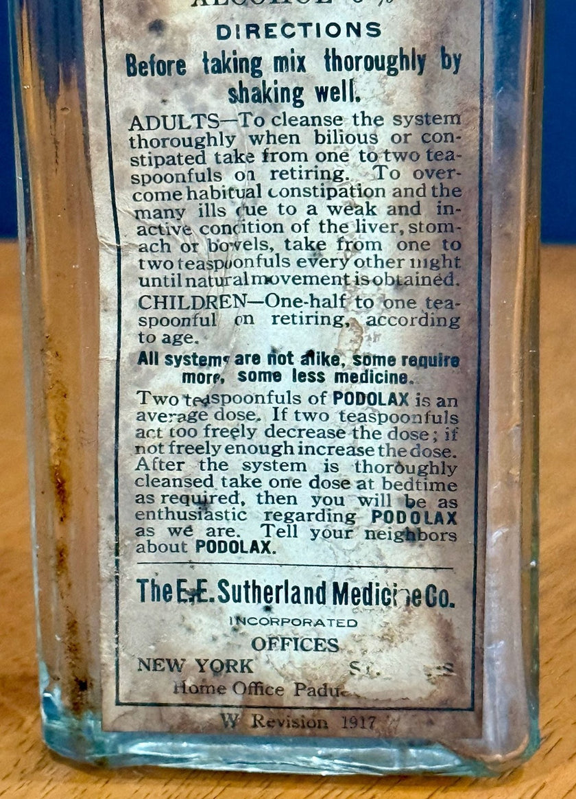 Antique Podolax Medicine Bottle E.E. Sutherland Medicine Co. with Label
