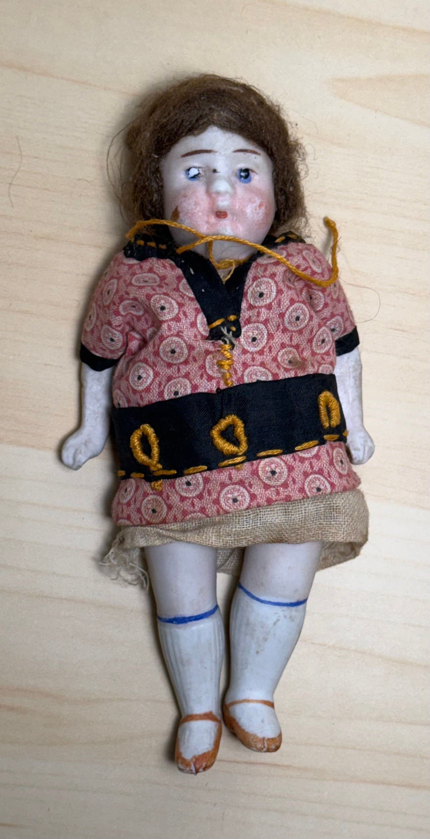 Antique Bisque Porcelain Jointed Doll Painted Blue Socks Original Cloth Dress