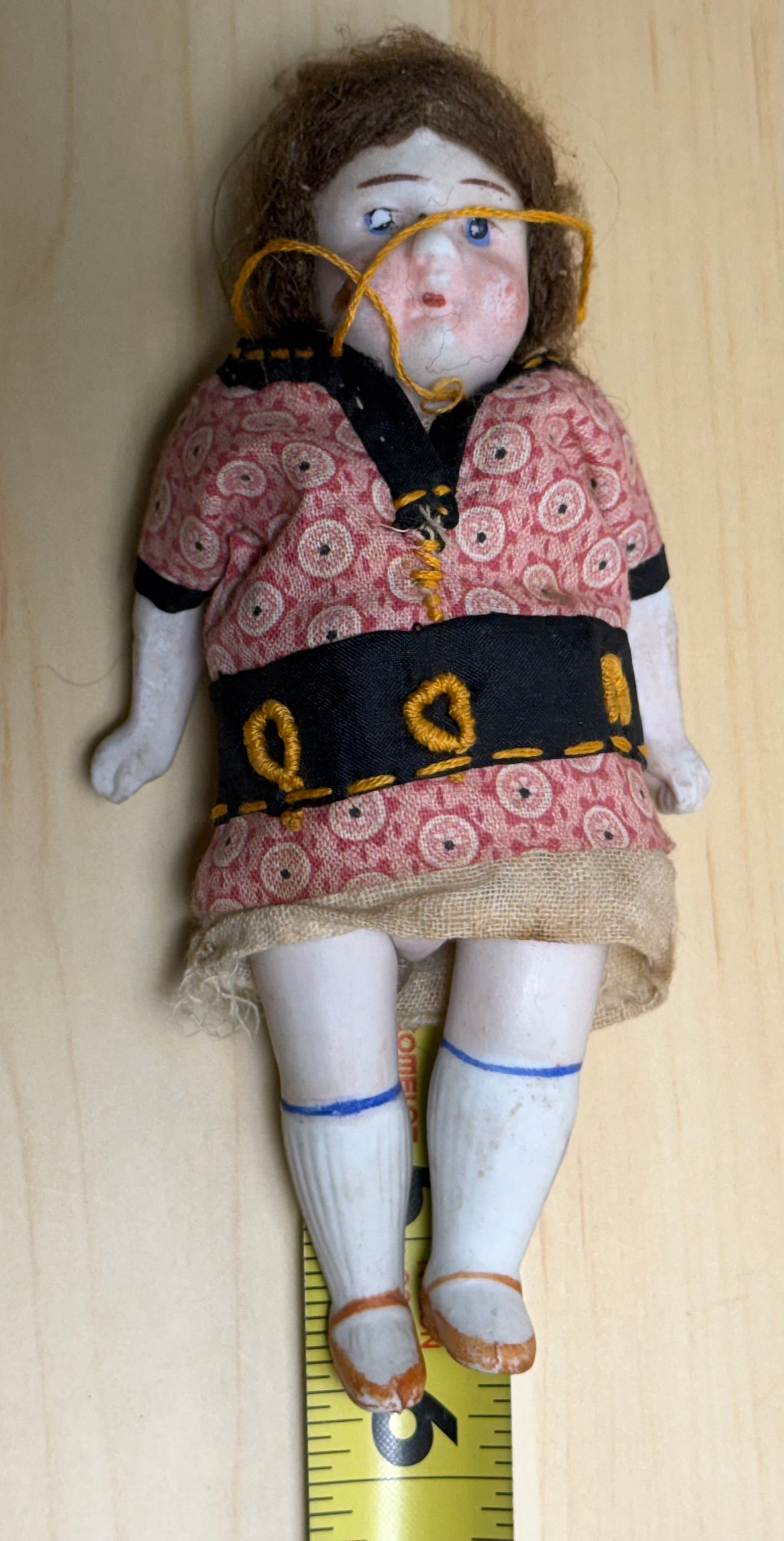 Antique Bisque Porcelain Jointed Doll Painted Blue Socks Original Cloth Dress