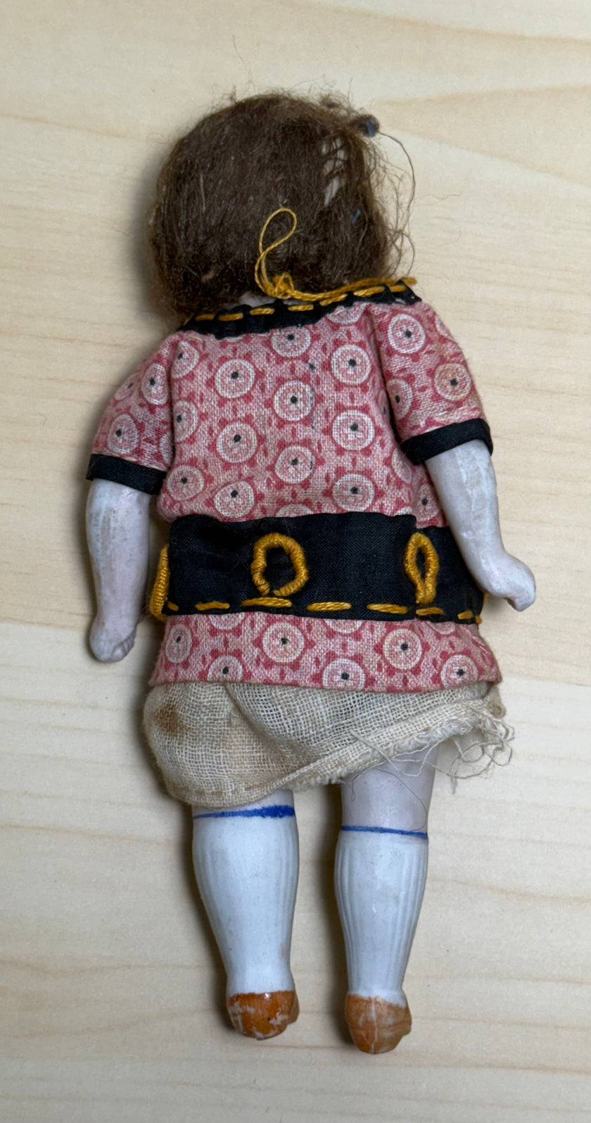 Antique Bisque Porcelain Jointed Doll Painted Blue Socks Original Cloth Dress