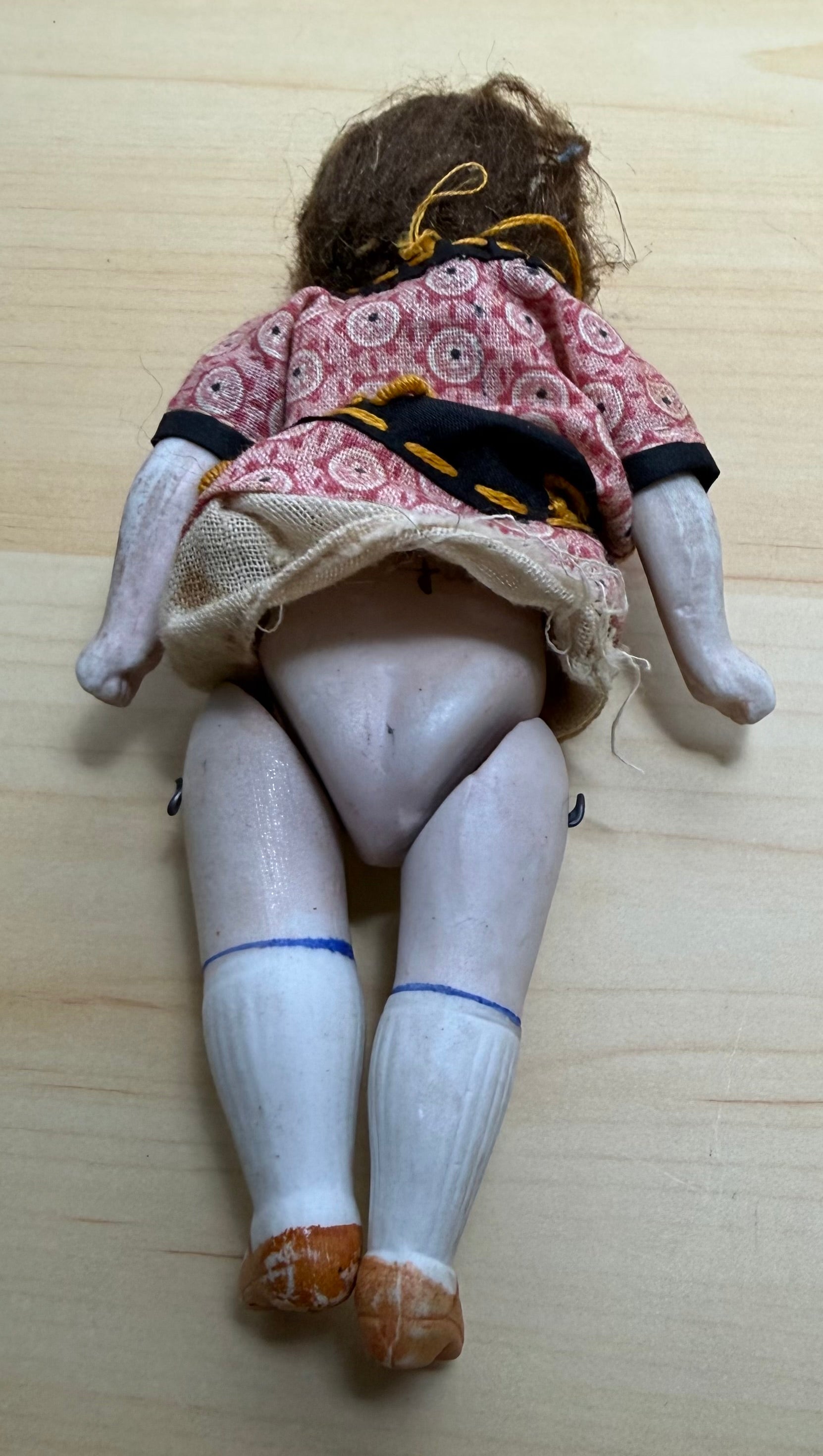 Antique Bisque Porcelain Jointed Doll Painted Blue Socks Original Cloth Dress