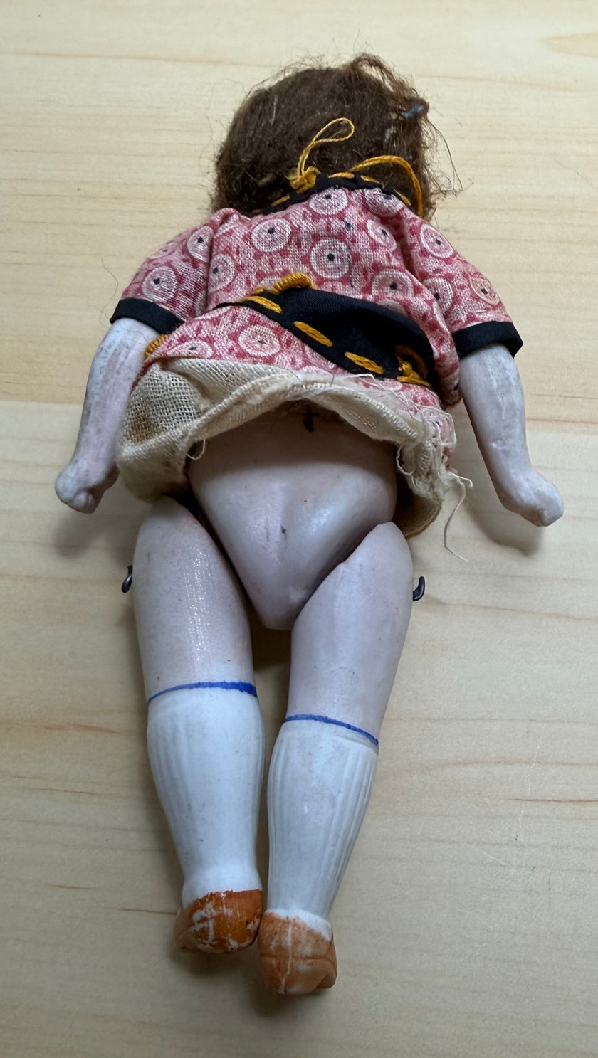 Antique Bisque Porcelain Jointed Doll Painted Blue Socks Original Cloth Dress