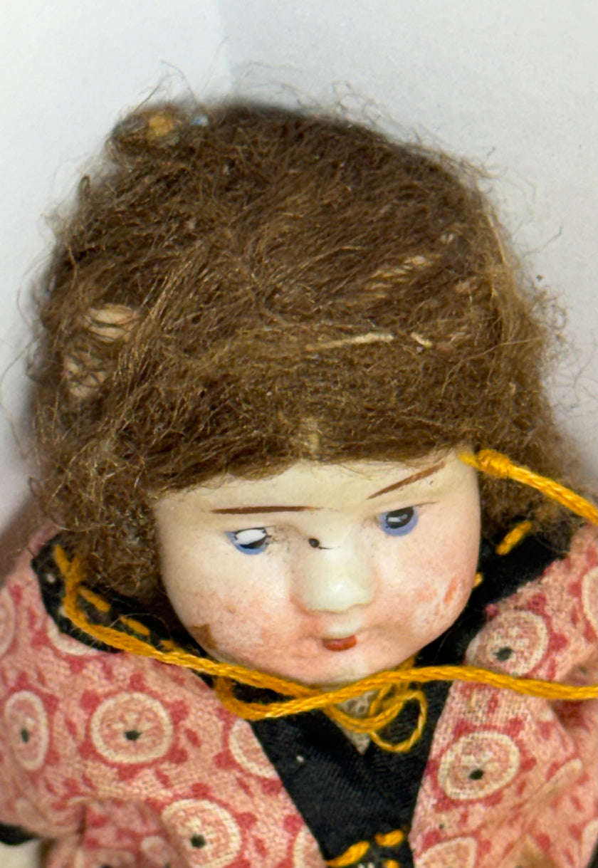 Antique Bisque Porcelain Jointed Doll Painted Blue Socks Original Cloth Dress